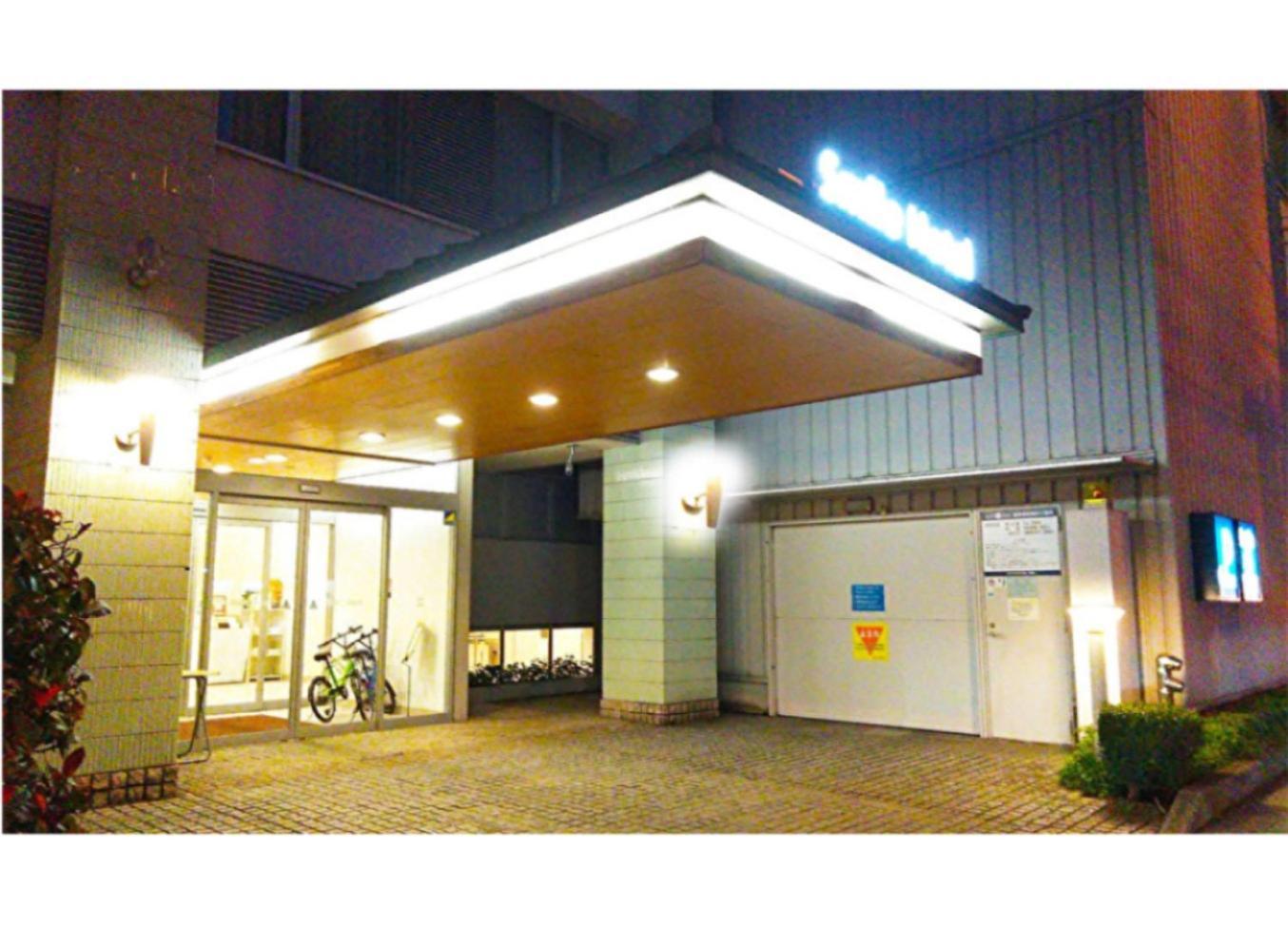 松山微笑酒店 外观 照片